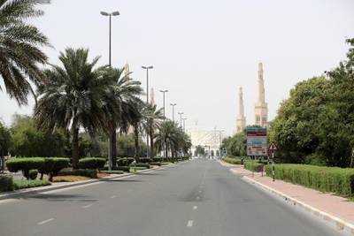 Al Ain, United Arab Emirates - Reporter: N/A: A quiet street leads to Sheikh Khalifa bin Zayed Grand mosque in Al Ain. Thursday, April 9th, 2020. Al Ain. Chris Whiteoak / The National