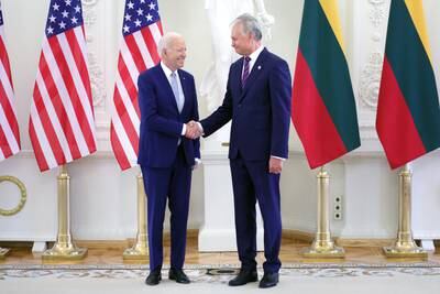 Lithuania's President Gitanas Nauseda, right, welcomes his US counterpart Joe Biden to the Presidential Palace in Vilnius before the Nato summit. EPA