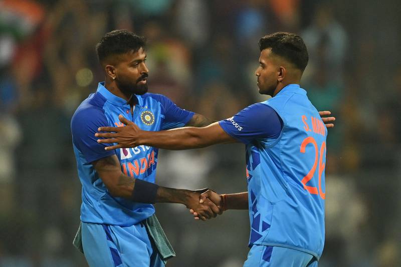 India captain Hardik Pandya, left, congratulates debutant Shivam Mavi after he took the wicket of Sri Lanka's Maheesh Theekshana during the first T20 in Mumbai. AFP