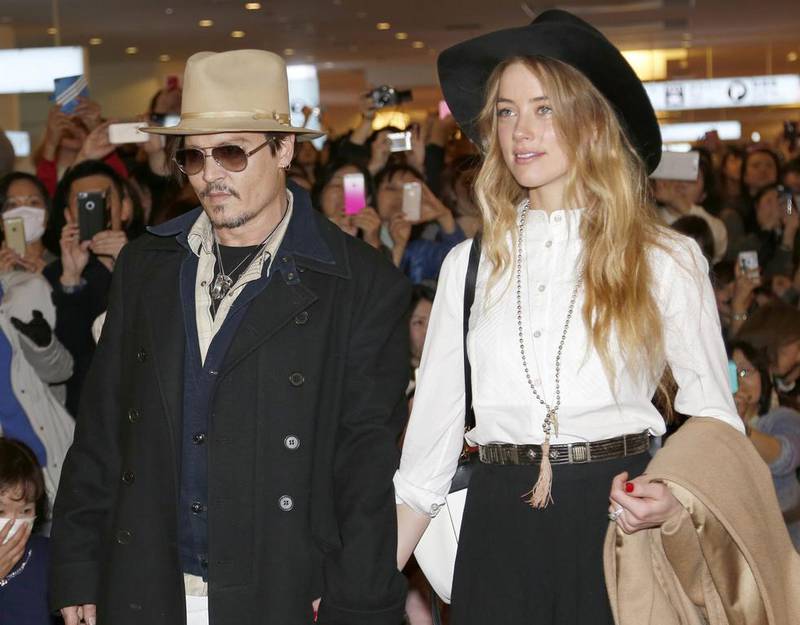 A mutual friend said that Johnny Depp and his wife Amber Heard were very in love yet often 'vicious' towards one another.