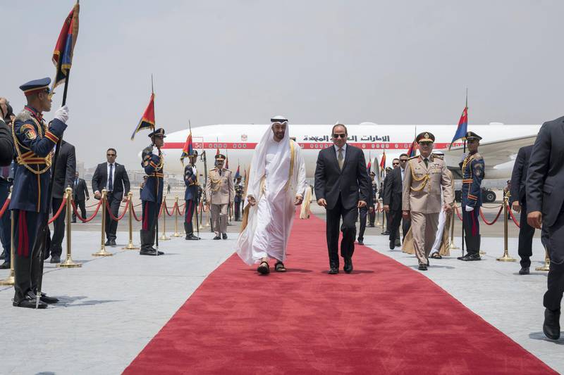 CAIRO, EGYPT - August 07, 2018: HH Sheikh Mohamed bin Zayed Al Nahyan Crown Prince of Abu Dhabi and Deputy Supreme Commander of the UAE Armed Forces (centre L), is received by HE Abdel Fattah El Sisi, President of Egypt (centre R), upon arrival at Cairo international Airport, commencing an official visit.

( Mohamed Al Hammadi / Crown Prince Court - Abu Dhabi )
---