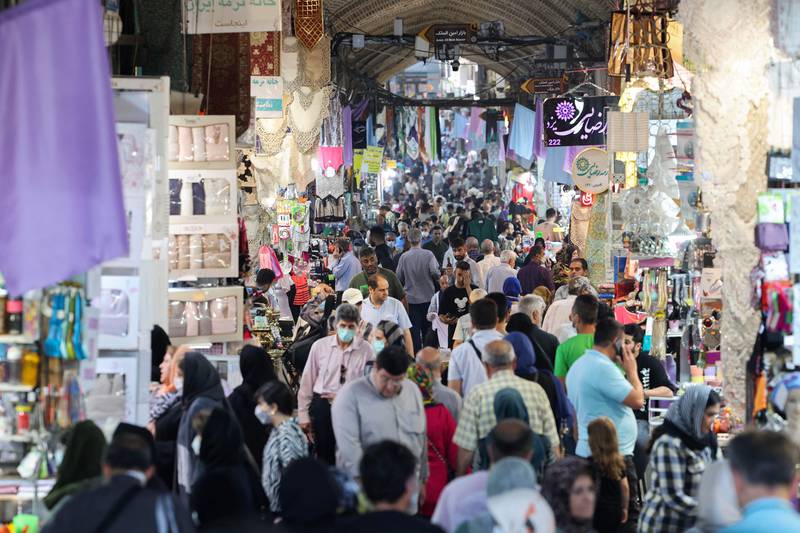 Iranians at the Grand Bazaar in the capital Tehran on June 13, 2022. AFP