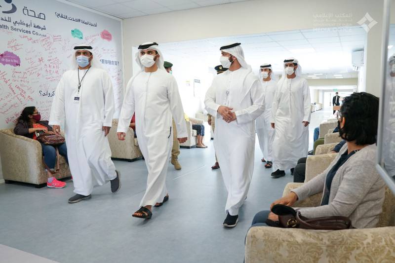Sheikh Mansoor bin Mohammed, chairman of the emirate's Supreme Committee of Crisis and Disaster Management, visits a Covid-19 vaccination centre in Dubai on Sunday. Courtesy: Dubai Media Office