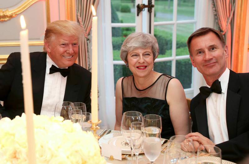 Donald Trump, Theresa May and Foreign Secretary Jeremy Hunt at the Return Dinner at Winfield House. AP