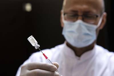 A healthcare worker prepares to vaccinate locals with the Janssen vaccine at the VUmc hospital in Amsterdam, the Netherlands. EPA