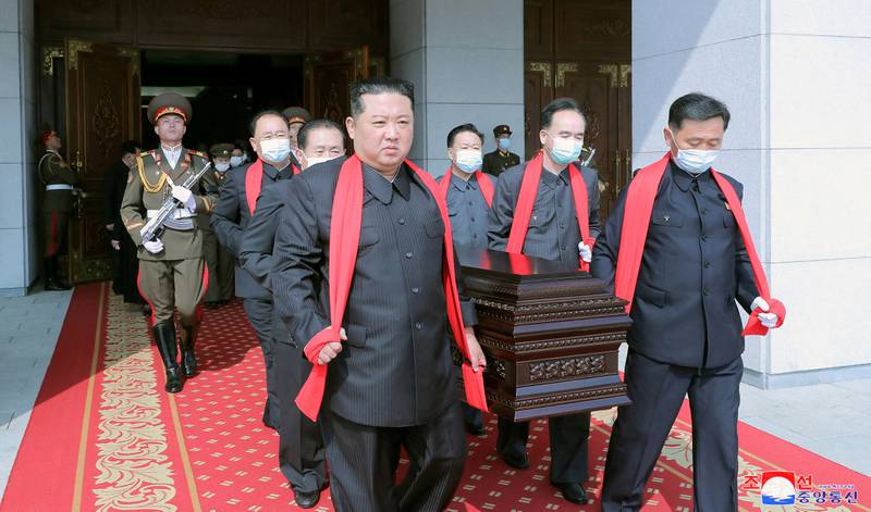 North Korean leader Kim Jong-un carries the casket during the state funeral for marshal of the Korean People's Army and general adviser to the Ministry of Defence, Hyon Chol-hae, in Pyongyang, North Korea, on May 22, 2022. KCNA via Reuters