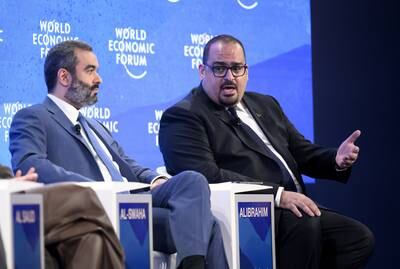 Saudi Arabia's Economy and Planning Minister, Faisal Alibrahim (R), and its Communications and Information Technology Minister, Abdullah bin Amer Alswaha, in Davos last year. EPA