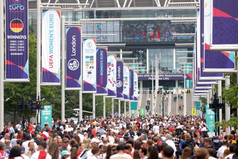 Fans arrive at Wembley Way before the Women's Euro 2022 final between England and Germany at the Wembley Stadium, London, on Sunday, July 31, 2022. PA