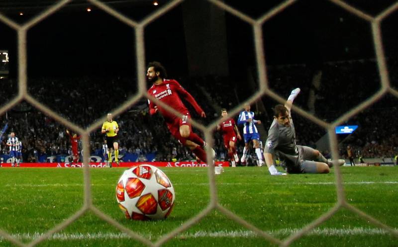 Salah scores Liverpool's second goal. Andrew Boyers / Reuters