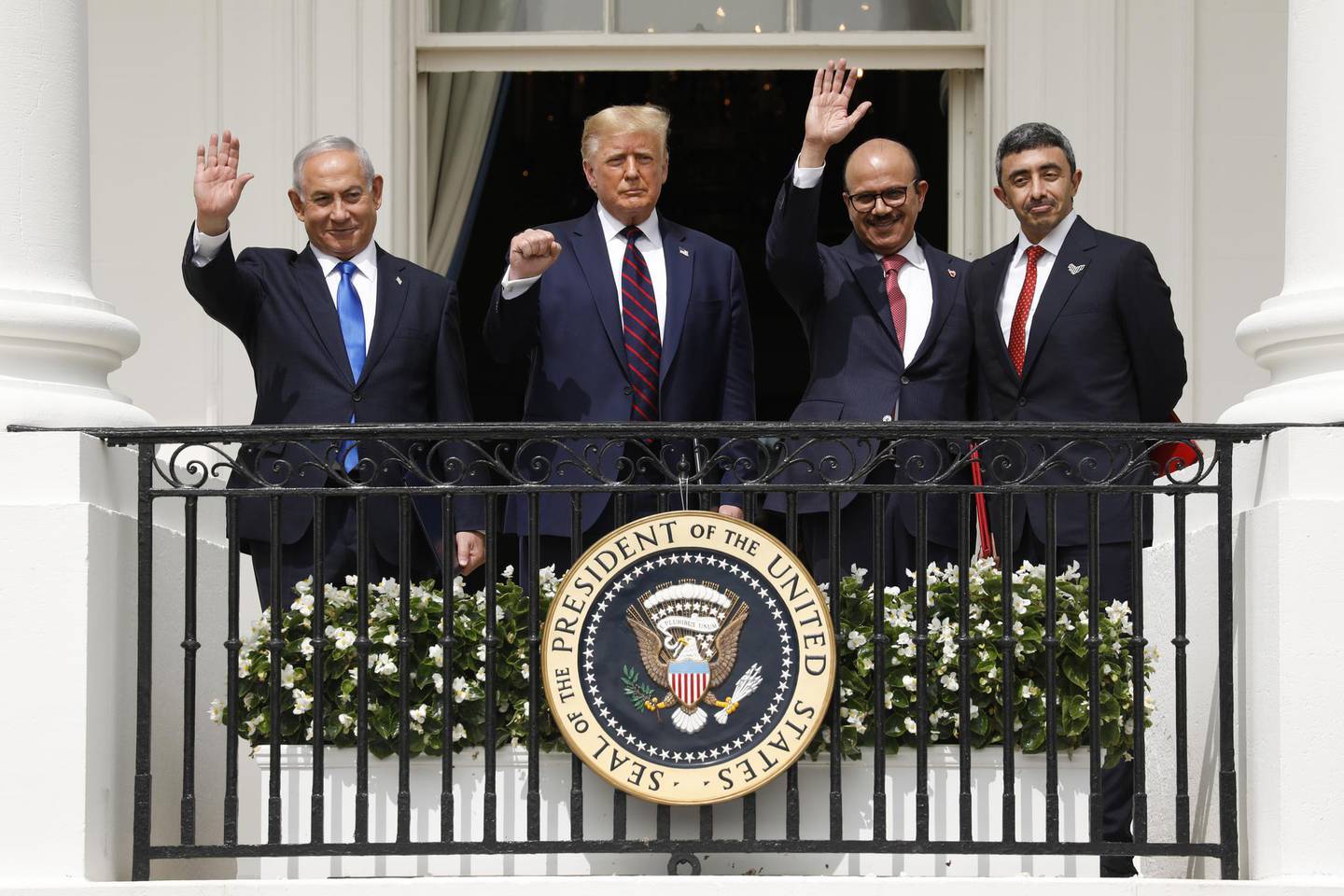 Benjamin Netanyahu, Israel's prime minister, from left, U.S. President Donald Trump, Abdullatif bin Rashid Al Zayani, Bahrain's foreign affairs minister, and Sheikh Abdullah bin Zayed bin Sultan Al Nahyan, United Arab Emirates' foreign affairs minister, stand during an Abraham Accords signing ceremony event on the South Lawn of the White House in Washington, D.C., U.S., on Tuesday, Sept. 15, 2020. The United Arab Emirates and Bahrain signed landmark agreements on Tuesday to move toward establishing normal relations with Israel, setting in motion a potentially historic shift in Mideast politics at a White House ceremony hosted by President Donald Trump. Photographer: Yuri Gripas/Abaca/Bloomberg