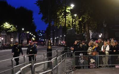 Police on patrol in Whitehall before Queen Elizabeth II's funeral at Westminster Abbey in London. EPA