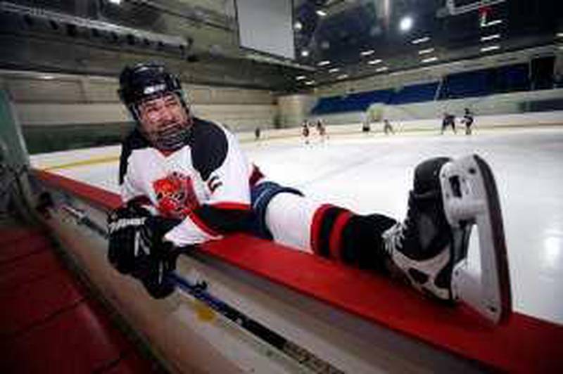 Abu Dhabi, UAE - December 28, 2008 -James Tester stretches before a Scorpians scrimmage at the Abu Dhabi Ice Skating Arena. (Nicole Hill / The National) *** Local Caption ***  NH Scorpian08.jpg