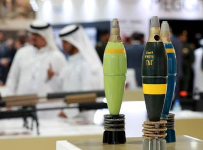 Abu Dhabi, U.A.E., February 20, 2019. INTERNATIONAL DEFENCE EXHIBITION AND CONFERENCE  2019 (IDEX) Day 4--  Colour images.-- Exhibition visitorslook at some explosives at the show.
Victor Besa/The National
Section:  NA