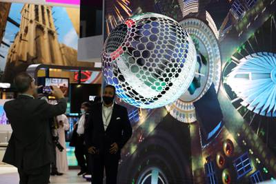 Visitors at the EXPO 2020 stand during the Arabian Travel Market held at Dubai World Trade Centre in Dubai on May 16,2021. Pawan Singh / The National. Story by Deena