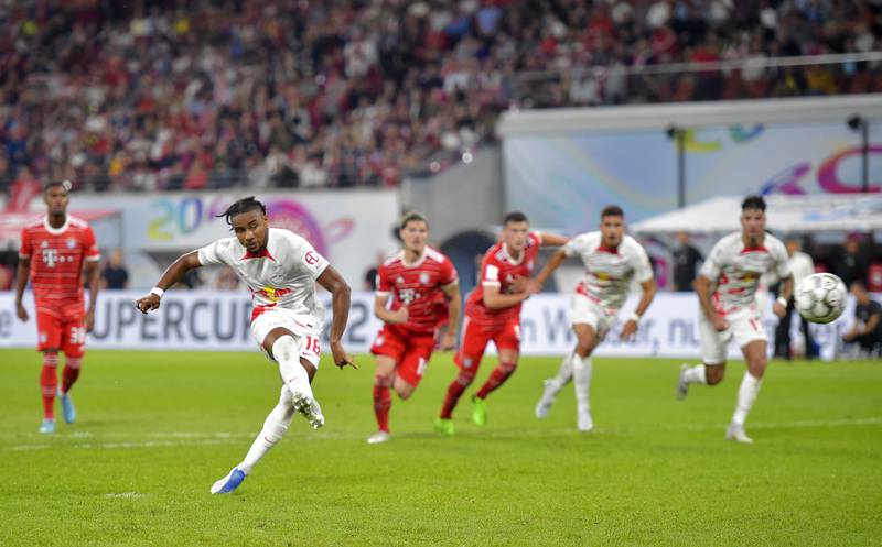 RB Leipzig's Christopher Nkunku scores their second goal from the penalty spot. Reuters