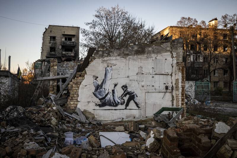 Graffiti by Banksy on a wall among the debris in Borodyanka in November 2022. Getty Images