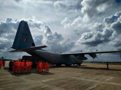 An Indian Air Force plane prepares to fly National Disaster Response Force staff from Kolkata to western Gujarat state in anticipation of Cyclone Tauktae. AP