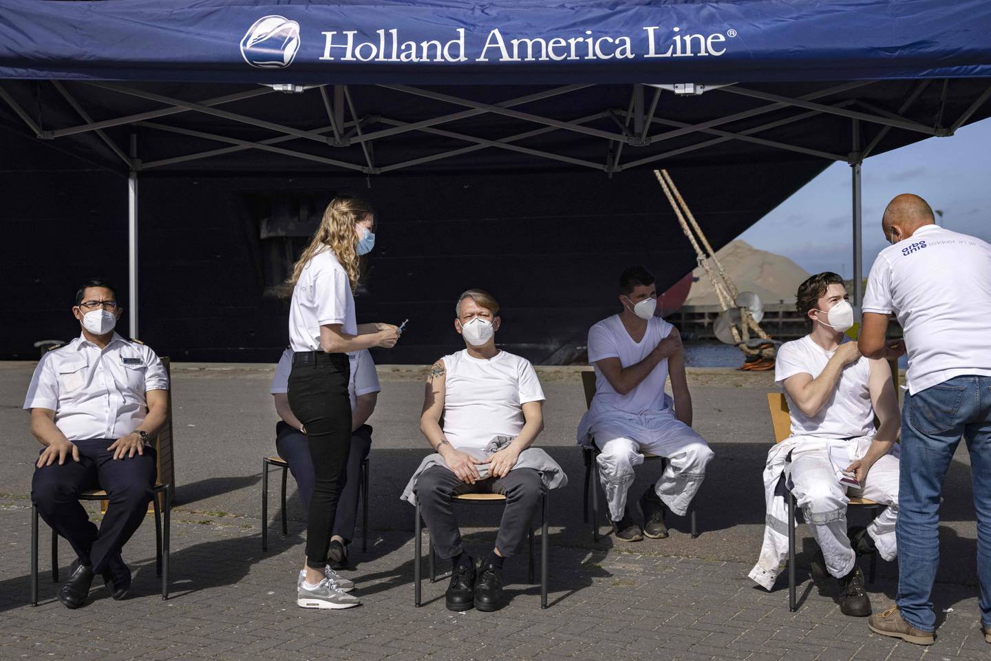 'Oosterdam' crew members receive a dose of the Janssen Covid-19 vaccine.
