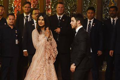 Newlyweds Indian Bollywood actress Priyanka Chopra  and US musician Nick Jonas attend the wedding. AFP