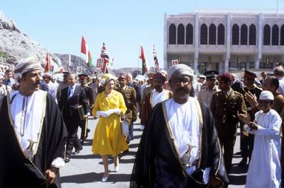 The queen walks in Muscat. Getty