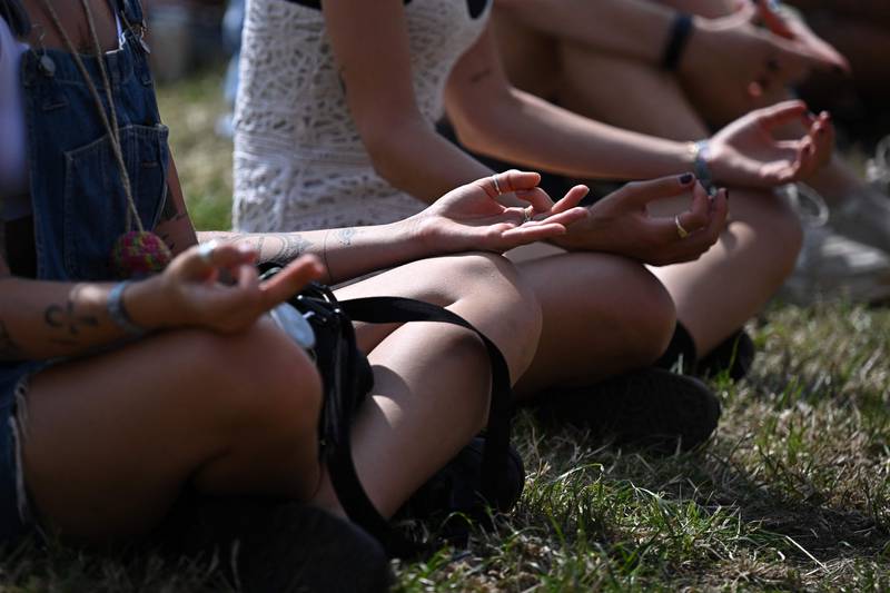 A mass meditation on Day 2 of the Glastonbury festival in Pilton, Somerset, south-west England, on June 22. AFP