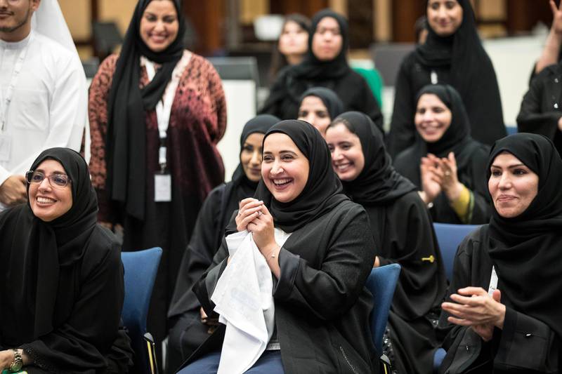 Candidate Maryam Bin Thaniah (C) celebrates after winning one of the seats for the Emirate of Dubai during the fourth session of Federal National Council elections at a polling station in Dubai, UAE.  EPA