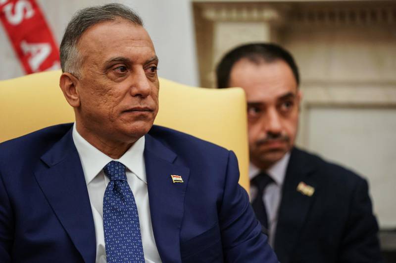 Mustafa al-Kadhimi, Iraq's prime minister, listens during a meeting with U.S. President Donald Trump, not pictured, in the Oval Office at the White House in Washington, D.C., U.S., on Thursday, Aug. 20, 2020. The U.S. is focused on working with Iraq to ensure it has enough resources to establish security forces that can protect the Iraqi people and are under sovereign control of Iraq, a senior administration official told reporters. Bloomberg