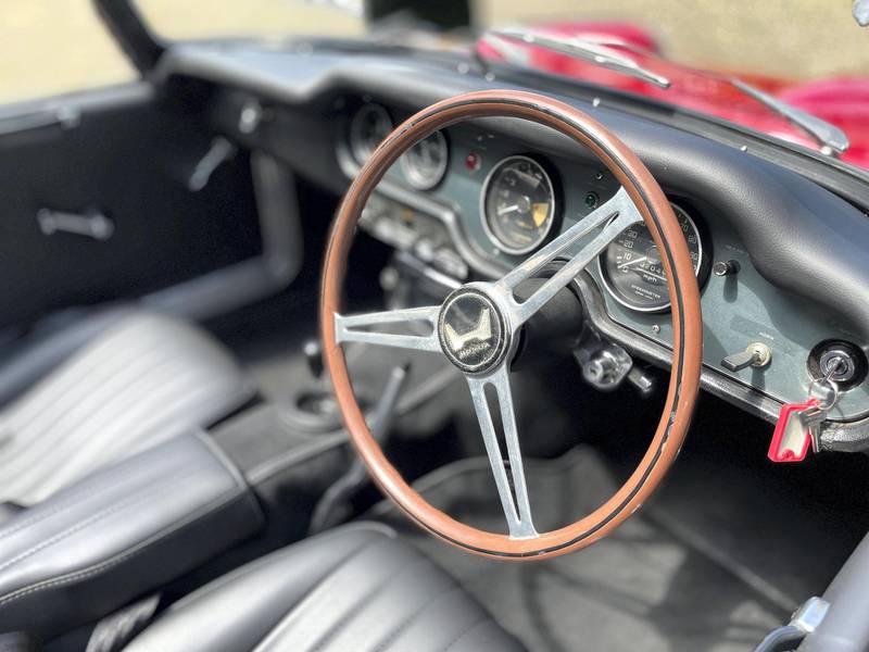 The review car came with the Honda S800's massive original wood-rimmed steering wheel