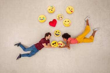 Hearts, kisses and a red rose all make Facebook's list of the top 10 most popular emojis in the Middle East. Getty Images