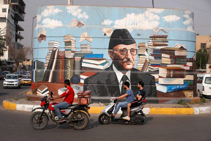 A picture shows a mural of Iraqi author Ali Al Wardi, drawn by Iraqi painter Wijdan Al Majed, on a concrete structure in the capital Baghdad. AFP