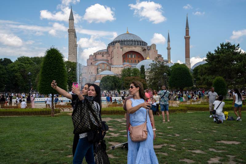 Tourists at Hagia Sophia mosque, in the Sultanahmet district of Istanbul. Bloomberg