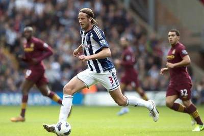 West Bromwich Albion's Swedish player Jonas Olsson, centre, is being sought by Queens Park Rangers but WBA has turned down the London club's offer.