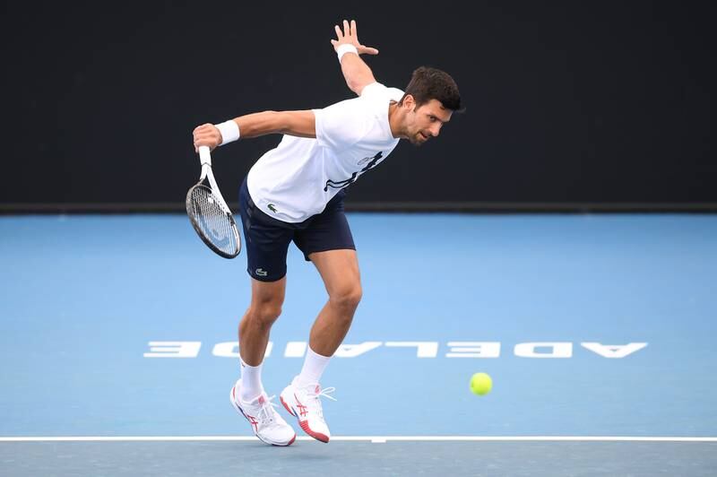 Novak Djokovic plays a backhand on during a media opportunity ahead of the 2023 Adelaide International. Getty