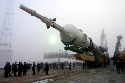 The Soyuz booster is transported to the launch pad at the Baikonur Cosmodrome in Kazakstan. Two days later,  US astronaut Bill Shepherd, and Russian cosmonauts Sergei Krikalyov and Yuri Gidzenko blasted off to become the first residents on the International Space Station. (AP Photo/Mikhail Metzel, File)
