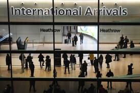 Travellers arrive at Heathrow Airport in London. Spain's Ferrovial is selling its 25% stake in Heathrow to PIF of Saudi Arabia and Ardian, a Paris-based private equity firm in £2.37 billion deal. EPA