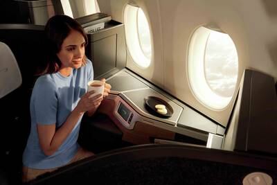 The business-class Club World suite has a fully flat bed and afternoon tea. Photo: British Airways