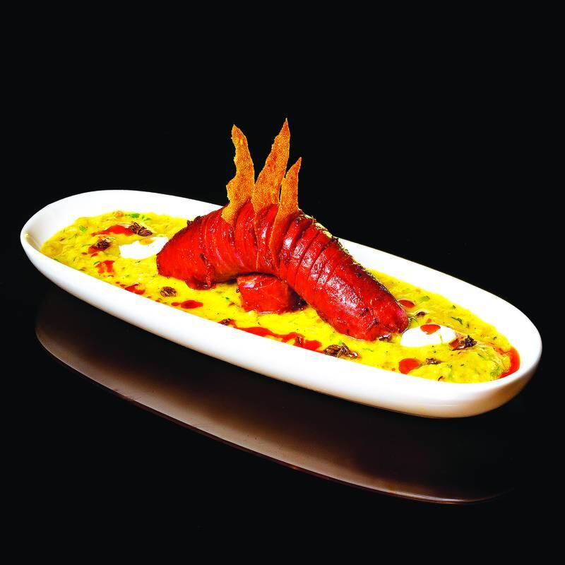 Mustard-oil fried sausage with masala mash fritters and Bengali rice kitsch-ree, by chef Manish Mehrotra, Indian Accent, New Delhi and New York