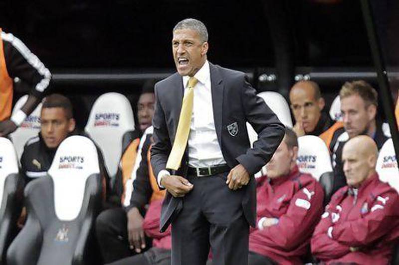 Norwich City manager Chris Hughton watches his side from the touchline.