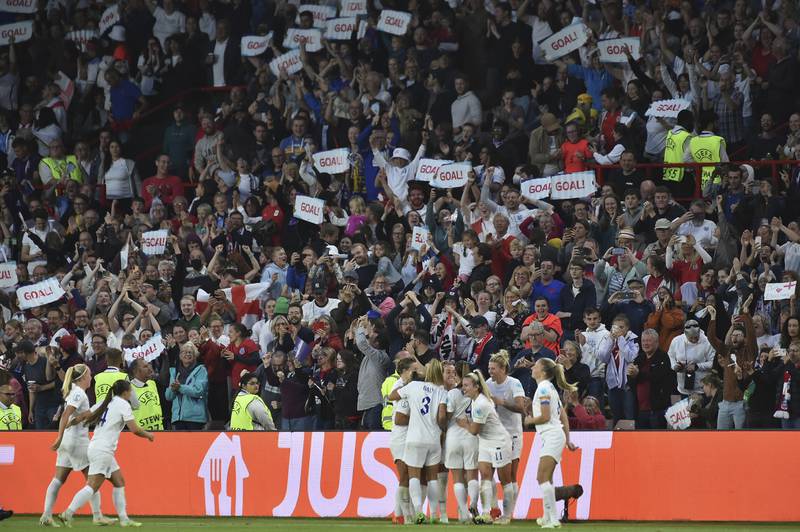 England's players celebrate after scoring a goal during the women's Euro 2022 semi-final against Sweden, on July 26. AP.
