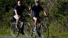 President Joe Biden falls from his bike - in pictures