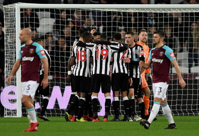 Soccer Football - Premier League - West Ham United vs Newcastle United - London Stadium, London, Britain - December 23, 2017   Newcastle United players celebrate after the match    Action Images via Reuters/Tony O'Brien    EDITORIAL USE ONLY. No use with unauthorized audio, video, data, fixture lists, club/league logos or "live" services. Online in-match use limited to 75 images, no video emulation. No use in betting, games or single club/league/player publications.  Please contact your account representative for further details.