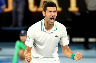 Novak Djokovic celebrates after beating Daniil Medvedev. AFP