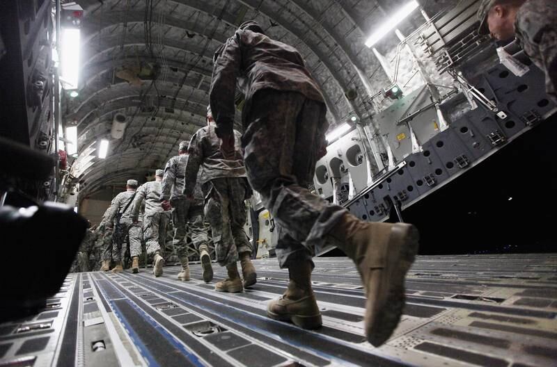 December 17, 2011: The last of the US Troop Brigade board a plane to depart Iraq at Camp Adder, now known as Imam Ali Base, near Nasiriyah, Iraq. Two days prior, the US military formally declared the end of the Iraq War in a ceremony in Baghdad. Getty