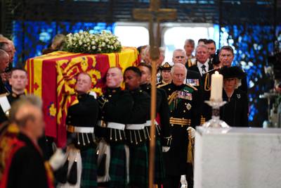  King Charles III follows Queen Elizabeth II's coffin as it enters the cathedral for a service of prayer and reflection at St Giles' Cathedral, Edinburgh. PA
