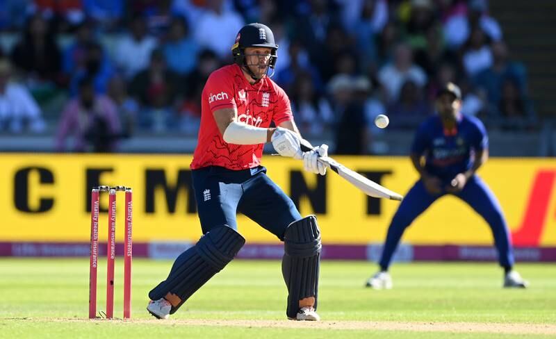 England batter David Willey attempts a scoop shot on his way to an unbeaten 33. Getty