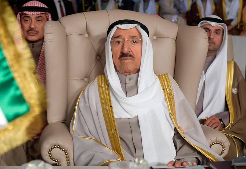 FILE - In this March 31, 2019 file photo, Kuwait's ruling emir, Sheikh Sabah Al Ahmad Al Sabah, attends the opening of the 30th Arab Summit, in Tunis, Tunisia. Kuwait said Sunday, Sept. 8, 2019, that its 90-year-old ruling emir Sheikh Sabah has been admitted to a U.S. hospital after an earlier health scare and will cancel an upcoming visit Thursday with President Donald Trump. (Fethi Belaid/Pool Photo via AP, File)