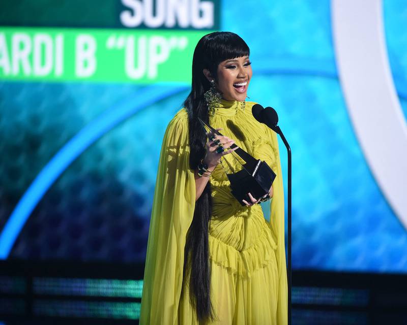 Cardi B accepts the Favourite Hip-Hop Song award at the 2021 American Music Awards.  American Broadcasting Companies / AFP