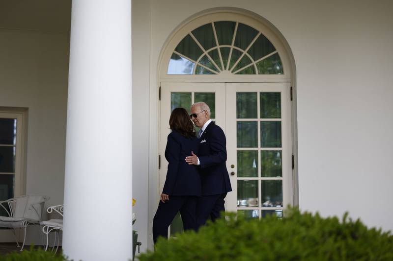 US President Joe Biden and Vice President Kamala Harris walk through the Colonnade of the White House together on Monday, April 11, 2022.  Bloomberg