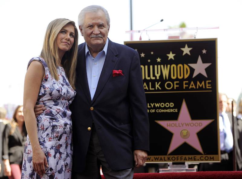 Actress Jennifer Aniston poses with her father, actor John Aniston, after she received a star on the Hollywood Walk of Fame in Los Angeles in 2012.  AP