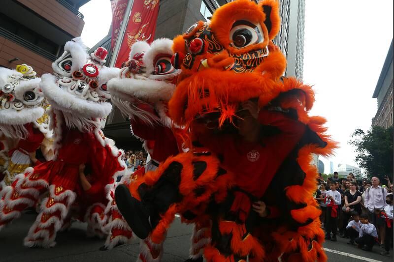 Members of the Chinese Youth League perform a lion dance for onlookers to celebrate Lunar New Year at Haymarket on January 21 in Sydney, Australia. Getty